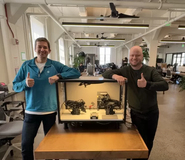 San Francisco startup MicroFactory developed a compact tabletop manufacturing kit featuring AI-trained robotic arms for precision tasks like circuit assembly, raising $1.5M at a $30M valuation to scale production and deliver units within months.